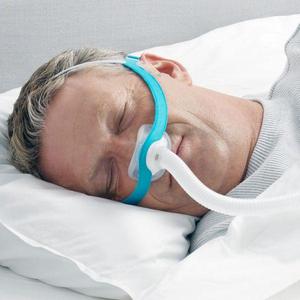 F&P Evora Mask on Man in Bed