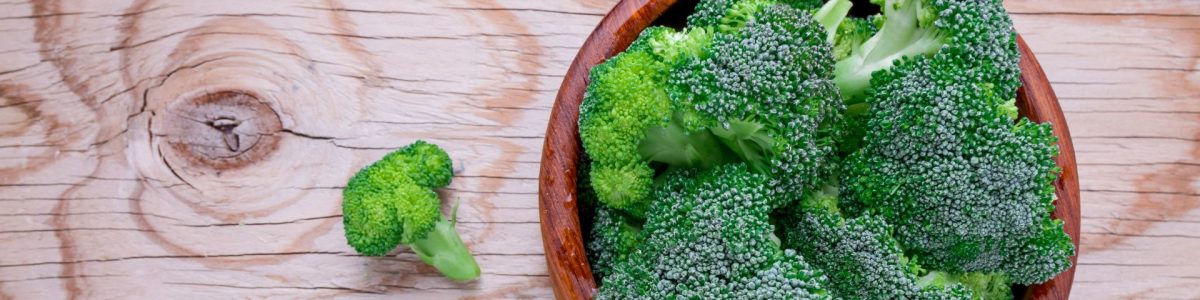 Photograph of a bowl of broccoli which is a calcium-rich food beneficial for promoting sleep