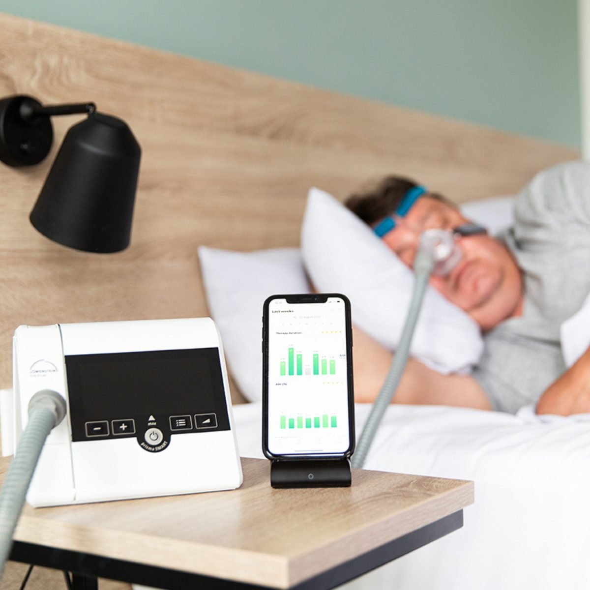 Prisma CPAP Machine on bedside table | Intus Healthcare