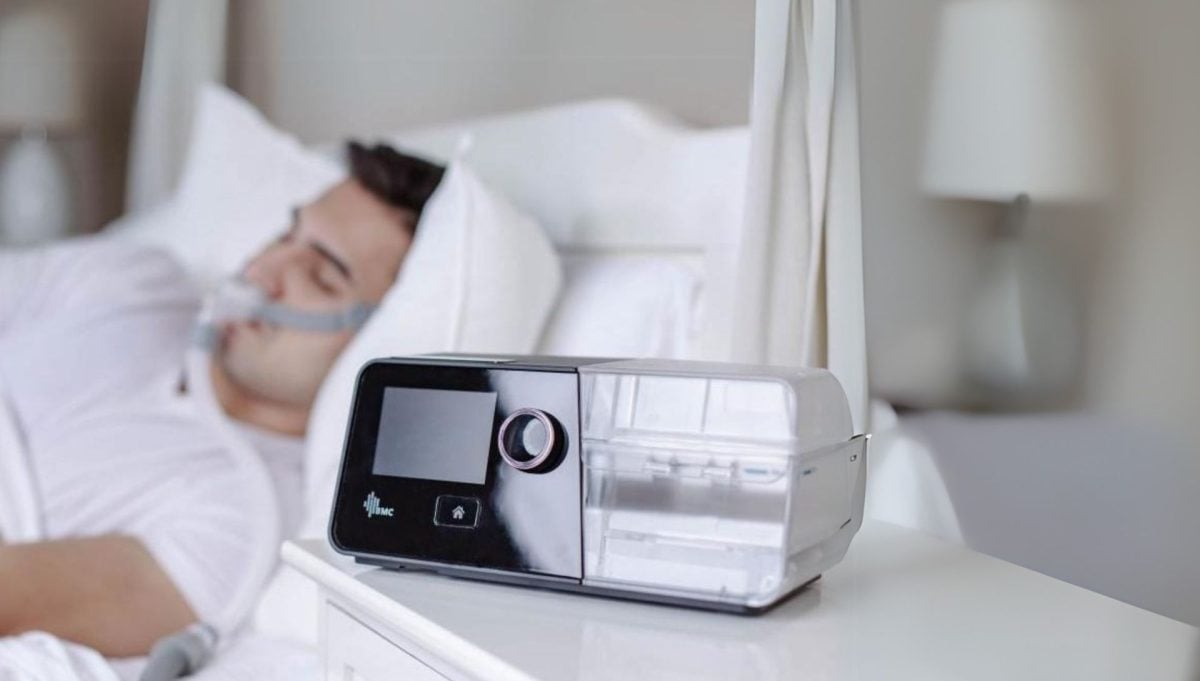 CPAP machine on bedside table rental service icon | Intus Healthcare