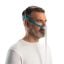 Side profile of man wearing the Fisher and Paykel Nova Micro Nasal Pillows CPAP Mask | Intus Healthcare